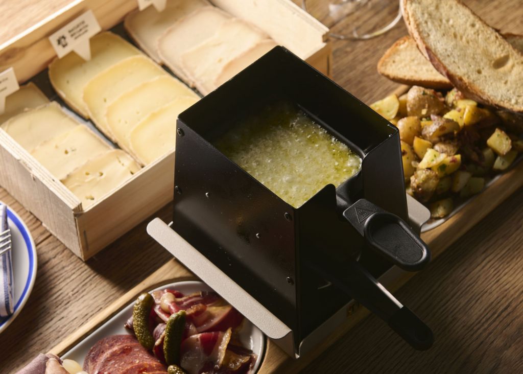 Barquette Raclette A Feast of Cheese, Companionship, and Wine Awaits At This Raclette Reverie