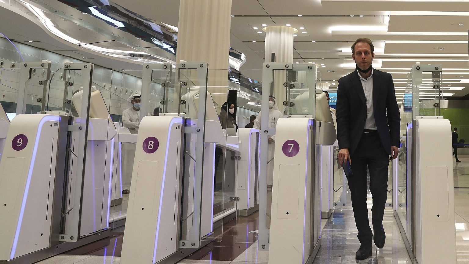 Travel creator documenting his arrival at Abu Dhabi airport