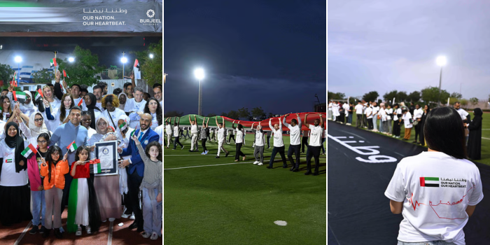 200KG UAE Flag Carried By 64 Nationalities Sets World Record In Abu Dhabi